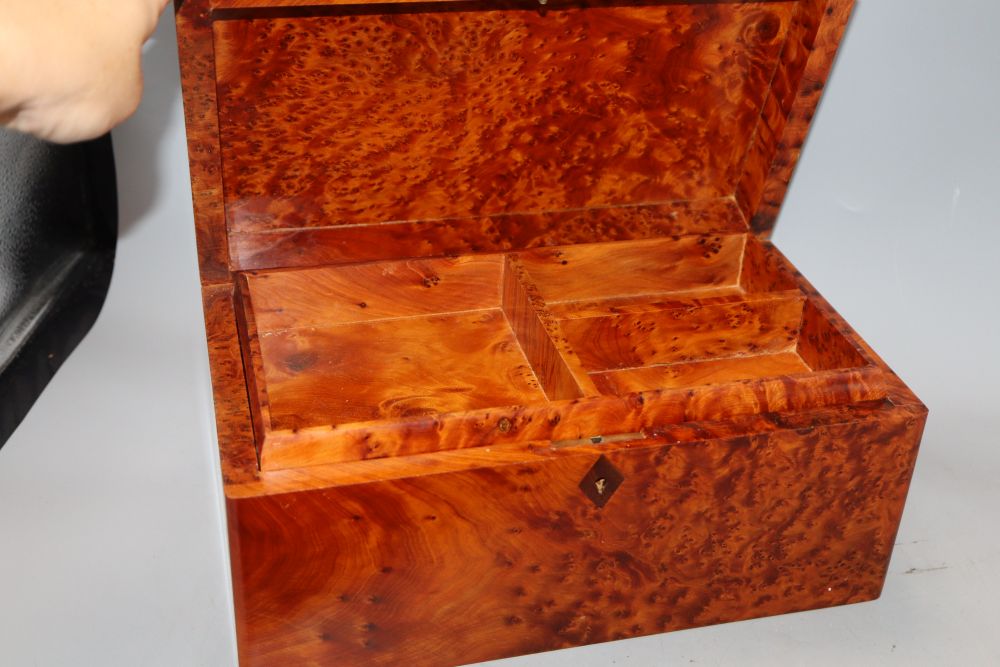 An amboyna jewellery box, 30 x 18 x 14cm, a pen stand and a Damascus box